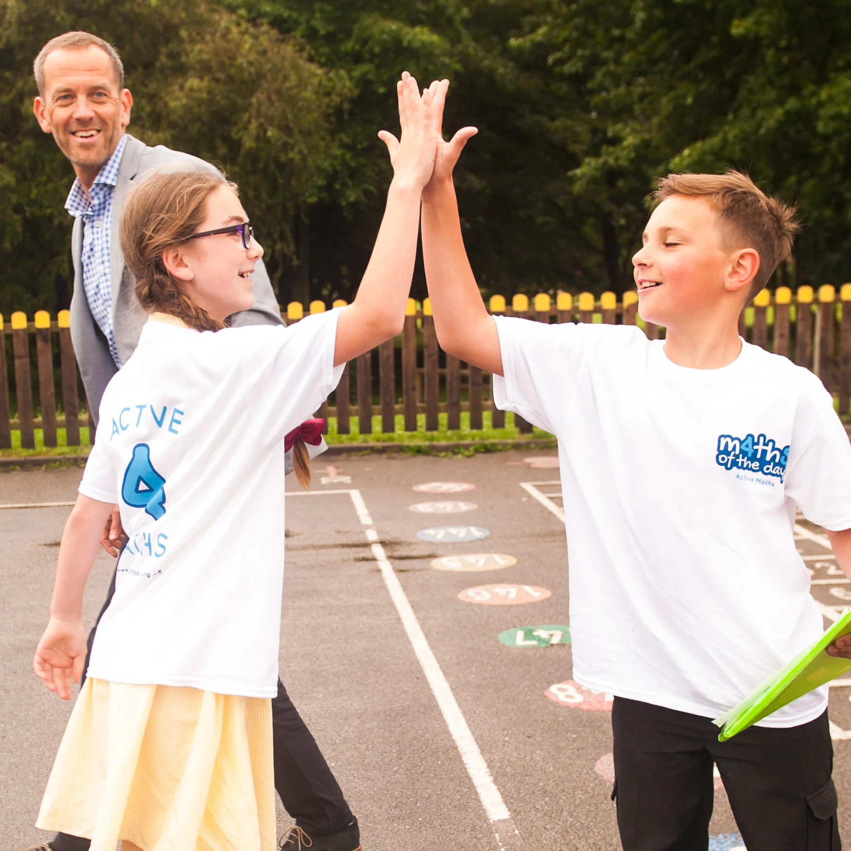 Kids outdoors taking part in active lesson